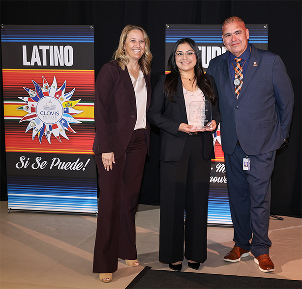 EECU staff member receiving recognition from Latino Student Success Conference